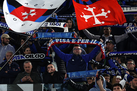 Pisa fans show scarves during the Serie A Enilive 2025-2026 football match between AS Roma vs Pisa Sporting Club 1909 at Olympic Stadium. Final result match: Roma - Pisa 3-0