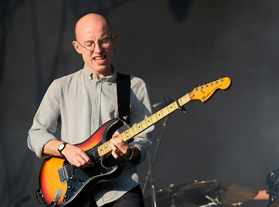 Jack Steadman, lead singer and guitarist with British alternative band Bombay Bicycle Club performing live on stage at UK family music and arts festival Camp Bestival in Lulworth, Dorset.