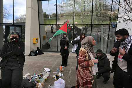 Protesters gather outside the police station before the demonstration. Protesters gathered outside Hatfield police station following the arrest of former Filton 24 prisoner and hunger striker Qesser Zuhrah. Counter terrorism police arrested her at her home for a social media post. Zuhrah was released from prison a month ago after spending 15 months on remand after being accused of breaking in and damaging weaponry at Elbit Systems Filton facilities in Bristol in August 2024.