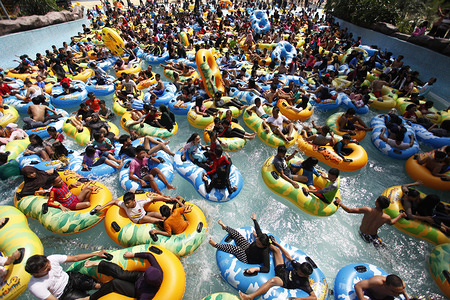 Visitors are seen playing on the waves in the water tourism area of ​​'The Jungle Adventure' in the City of Bogor. The Jungle Adventure water tourism is included in the top 10 best water tourism categories in the Asia Pacific in 2018, targeting 100 thousand of visitors during the school holiday and Christmas Day.