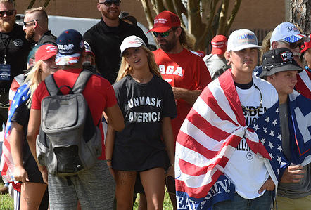 Supporters of U.S. President Donald Trump wait in line without face masks to enter a Great American Comeback campaign rally at the Jacksonville JetPort at Cecil Airport.
With 40 days until the 2020 presidential election, recent polls show a tight race between Trump and his democratic opponent, former U.S. Vice President Joe Biden.