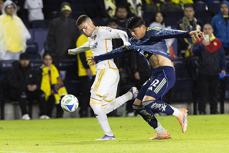 Los Angeles Galaxy's Gabriel Pec (11) and Club America's Miguel Vázquez (32) in action during an international friendly soccer match between Los Angeles Galaxy and Club America at Dignity Health Sports Park. Final score; Club America 2:2 LA Galaxy