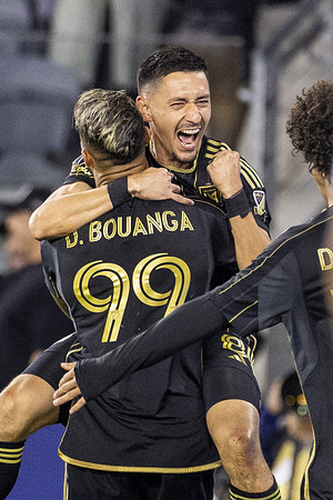 Los Angeles FC's Marky Delgado #8 celebrates with Dénis Bouanga #99 after scoring against the Colorado Rapids during an Concacaf Champions Cup soccer match at BMO Stadium. Final scores; Los Angeles FC 1:0 Colorado Rapids.