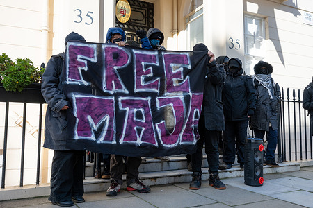 Protesters stand outside the Hungarian Embassy holding a banner reading "Free Maja" during the rally. Anti-fascist activists gathered outside the Hungarian Embassy in London in response to the Hungarian government’s designation of Antifa as a terrorist organisation and the sentencing of anti-fascist activists in Hungary. Demonstrators called for the release of Maja T, Gabriele M and Anna M, who were recently given prison sentences following a show trial, and condemned what they described as the criminalisation of opposition to fascism.