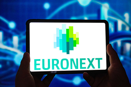 In this photo illustration, the Euronext logo is displayed on the screen of a smart tablet.