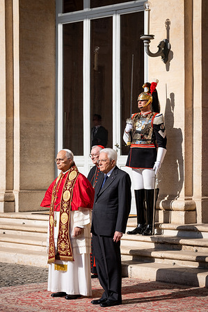 Pope Leo XIV is welcomed by Italian President Sergio Mattarella as he arrives at the Quirinale Presidential Palace