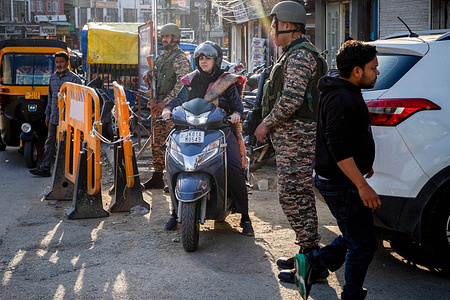 Indian paramilitary soldiers stand alert along a street in Srinagar, the summer capital of Jammu and Kashmir. Security forces are on alert across parts of Indian-administered Kashmir to mark the the one year anniversary of the May 7 escalation that followed a deadly militant attack in Pahalgam, where gunmen killed 26 civilians, mostly tourists, on April 22, 2025. The assault was one of the deadliest attack against civilians, it triggered heightened tensions between nuclear-armed rivals India and Pakistan, culminating in cross-border strikes by India after it launched Operation Sindoor targeting alleged militant infrastructure, followed by retaliatory firing and heightened military alert by Pakistan along the Line of Control, before a ceasefire understanding was later reaffirmed by both sides after international diplomatic efforts. Indian authorities say Operation Sindoor remains ongoing.