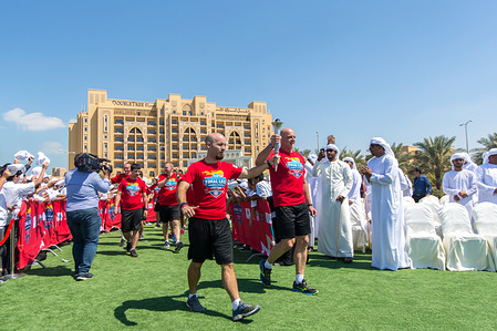 Athletes from the Special Olympics World Games 2019 are seen holding the Special Olympic torch bringing to Al Marjan Island during the final leg of the Law Enforcement Torch run.
The Special Olympics World Games 2019 will be hosted in Abu Dhabi, United Arab Emirates in March 2019 for the first time in the Middle East and North Africa since the movement’s founding over 50 years ago. The final stage of the Special Olympics Law Enforcement Torch Run was held on Al Marjan Island, Ras Al Khaimah. The event was celebrated with traditional Emirati music and dances. The CEO of Marjan and Master Developer of Ras Al Khaimah, Mr Abdulla Al Abdouli opened the event.