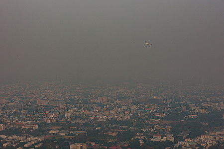 Chiang Mai city scape is pictured amidst dust. Chiang Mai became top pollute city of the world with concentration of PM2.5 at 147.3 µg/m³ that 29.5 times the WHO annual air quality guideline value. The city was cover by the mist of air pollute that might cause health effects.