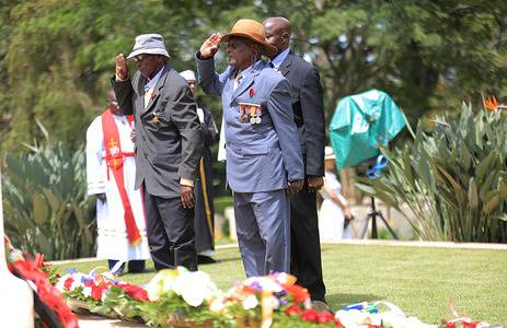 World War Veterans, Mutemi Nwinza (left) laying wreaths with his counterpart, Samuel Nyahure (Right) of 11th Battalion during the commemoration ceremony of World War Veterans held at the Commonwealth War Graves Cemetery that was opened in 1941 by the military authorities. It contains 1,952 Commonwealth burials of the Second World War, 11 of which are unidentified. Nairobi was the headquarters of the East African Force.