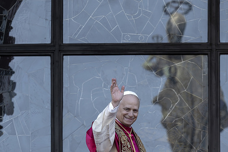 Pope Leo XIV greets the faithful from the loggia of St. Mary Major Basilica in Rome, during his visit and veneration of the Icon of the Blessed Virgin Mary 'Salus Populi Romani'.