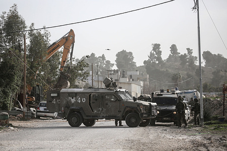 Israeli soldiers seen guarding military bulldozers and took security measures when the Israeli army was demolishing a shop and car repair shop owned by two Palestinians claiming they lacked the necessary permits near the Awarta checkpoint. A Jewish settler organization announced it is demanding the demolition of 11,000 Palestinian homes built near settlement roads and in Area C, as defined by the Oslo Accords.