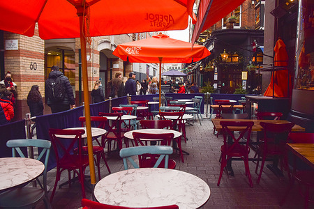 An empty restaurant is seen in Soho. 
Restaurants have reported a huge drop in bookings due to fears over the growing number of COVID-19 cases as the Omicron variant spreads.