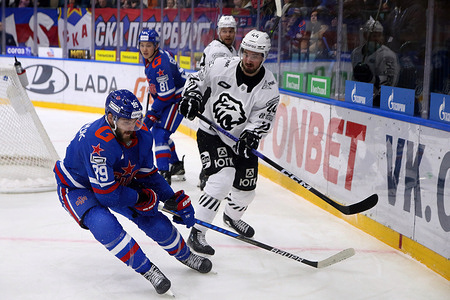 SKA Hockey Club player, Alexander Galchenyuk (89) and Traktor Hockey Club player, Ilya Nikolaev (44) seen in action during the Kontinental Hockey League, regular season KHL 2023 - 2024 between SKA Saint Petersburg and Traktor Chelyabinsk at the Ice Sports Palace. 
(Final score; SKA Saint Petersburg 4:3 Traktor Chelyabinsk)
