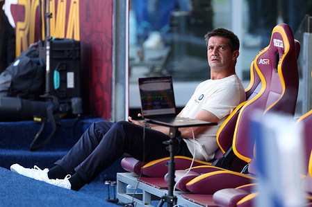 Cristian Chivu (Coach) of Internazionale Milan seen sitting on the bench, he watches his Inter players warm up before the Italian Serie A Enilive Championship 2026-2027 of the football match-day 5 between AS Roma vs FC Internazionale Milan at Olympic Stadium. Final result match: Roma 2:2 Inter