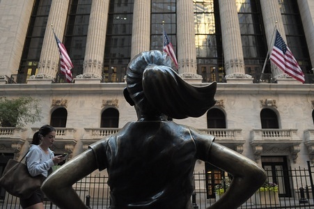 The "Fearless Girl" statue is seen in front of the New York Stock Exchange in the Financial District in Manhattan, New York City.