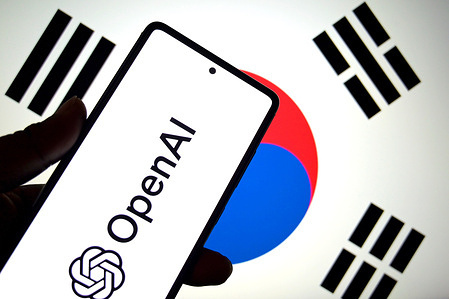 In this photo illustration, an Open AI logo is seen displayed on a smartphone with the flag of South Korea in the background.