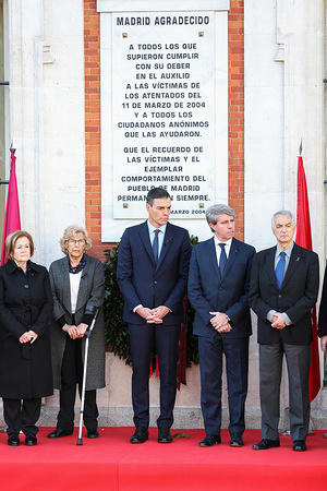 Angel Garrido (R), Pedro Sanchez (C) and Manuela Carmena (L) member of the foundations AVT are seen attending the floral offering during the tribute to the victims of the 11M attack.