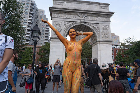 (EDITORS NOTE: Image contains nudity)
A nude model poses during the 8th annual 'NYC Body Painting Day' at Washington Square Park in New York City.
Over 30 artists gathered to paint more than 50 nude models before marching from Union Square Park along Fifth Avenue to Washington Square Park. This year's theme is resilience.