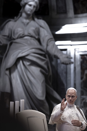 Pope Leo XIV gives his blessing during the meeting with pilgrims from the Dioceses of Umbria in St. Peter's Basilica.