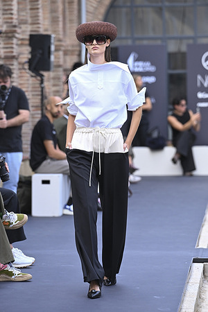 A model parades with Moisés Nieto design during Mercedes Benz Fashion Week Madrid Cibeles Palace.
