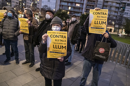 Protesters are seen with placards during the demonstration.
Dozens of demonstrators gathered in front of the Endesa electricity company to protest against the frequent power cuts and the rise of electricity price.