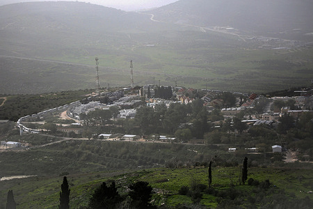 Shavei Shomron settlement is surrounded by Israeli buses that transported hundreds of Jewish settlers to the tree-planting ceremony for Tu B'Shvat in new settlement outposts established after October 7, 2023, in Palestinian-controlled territory near Nablus in the West Bank.