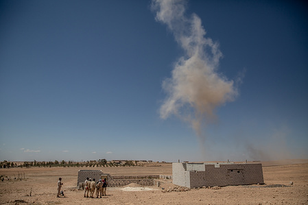 Employees of the Mines Advisory Group NGO watch as explosives, gathered during the demining operations in northern Syria, are detonated remotely. Syria has been described as one of the most land mine-affected places in the world, with reported injuries increasing as Syrians tried to return home after the fall of the Assad regime in December 2024.