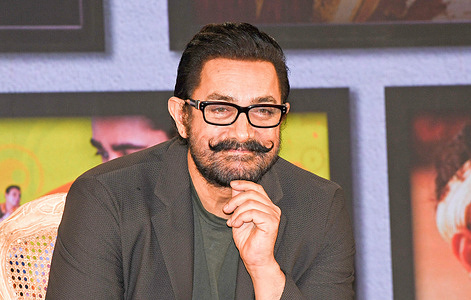 Bollywood actor and filmmaker Aamir Khan is seen during a press conference held to announce streaming of his film 'Sitaare Zameen Par' on YouTube platform starting from 1st August at an event in Mumbai.