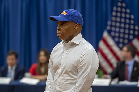 New York City Mayor Eric Adams listens to Commanding Officer of Patrol Borough Queens North Deputy Chief Christine Bastedenbeck during Community Conversation event at Frank Sinatra School of the Arts High School, Astoria on May 28, 2024 in the Queens Borough of New York City.