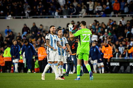 Nicolas Otamendi (L), Nicolas Tagliafico (C) and Emiliano Martinez of Argentina (R) celebrate before the match between Argentina and Paraguay as part of FIFA World Cup 2026 Qualifier at Estadio Monumental Antonio Vespucio Liberti. Final score; Argentina 1 - 0 Paraguay Final Score: San Lorenzo 1 - 1 Boca Juniors