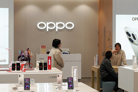 The OPPO retail store showcases the latest smartphones and accessories, with staff ready to assist customers in a modern, minimalist setting.