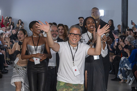 Chris Habana (C) and crew walk the runway finale for the "POP"-CHRISHABANA fashion show during Spring 2026 New York Fashion Week at Ideal Glass Studios.