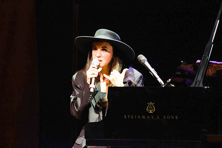 Karsu Donmez performs on stage at the Second Century Economics Congress in Izmir.