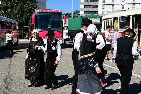 A folk group musical entertainment during the 100th anniversary celebration of the Iveco Bus factory and company in Ardèche in the town of Annonay.