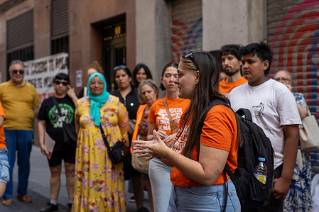 Activists from the Madrid tenants' union seen during the eviction of a family from their home by a bank.