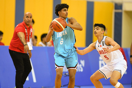 Jaideep Radthore (L) of India Basketball team in action during the 2022 FIBA U16 Asian Championship match between India and Bahrain at the Al-Gharafa Sports Multi-Purpose Hall. Final score; India 80:41 Bahrain.
