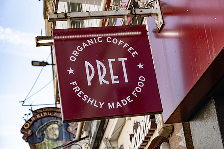 Company brand logo sign for Pret a Manger a British multinational sandwich shop chain founded in London, a fast casual style restaurant and takeaway business.