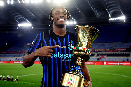 Yann Bisseck of FC Internazionale seen holding a trophy during the Award ceremony at the end of the Coppa Italia Frecciarossa Final football match 2025-2026 between SS Lazio and Inter - FC Internazionale at Olympic Stadium. Final Score ; SS Lazio 0 : 2 FC Internazionale.