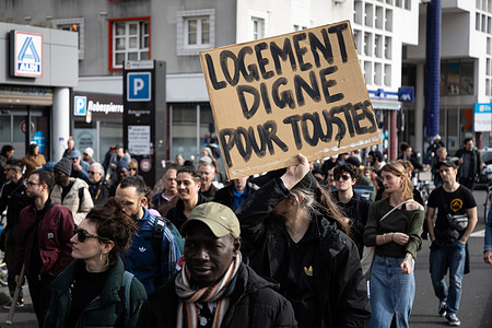 A demonstrator holds a placard that says "decent housing for all" during the demonstration for the right to housing in Vitry-sur-Seine, on the outskirts of Paris. In Val-de-Marne, as elsewhere, the property market benefits speculators, and tenants in precarious situations pay the price. Low-income households struggle to find housing and are suffocating in apartments that are too expensive, too small and often unsanitary. Administrative precariousness blocks any access to decent long-term housing. Rents are rising inexorably, and evictions of precarious tenants and squatters are increasing year after year. Dozens of persons gathered to demonstrate for housing right in front of the Vitry Sur Seine City Hall, in the outskirts of Paris.