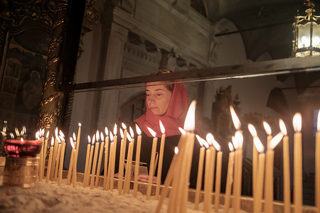People seen lighting candles, praying at the Greek Orthodox Patriarchate of Constantinople and gathering for Epiphany. The Greek Orthodox Patriarchate of Istanbul held a water blessing ceremony and liturgy as part of Epiphany celebration. Epiphany commemorates the baptism of Jesus Christ by John the Baptist in the Jordan River and falls on the 12th day after Christmas.