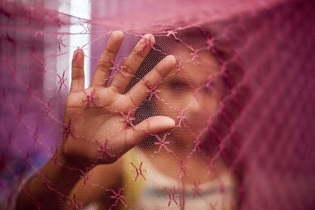 Laura, a 7 years old girl has been sexually assaulted by a relative poses in the room that she shares with 5 other brothers. The business boom in Grenada has led to an increase in the number of child prostituted and abused. According to the Nicaraguan Coordinating Federation of NGOs working with Children and Adolescents (Codeni), about 20,000 Nicaraguan children and adolescents are victims of sexual exploitation.