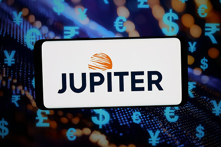In this photo illustration, the logo of British company Jupiter Fund Management plc is displayed on a smartphone.