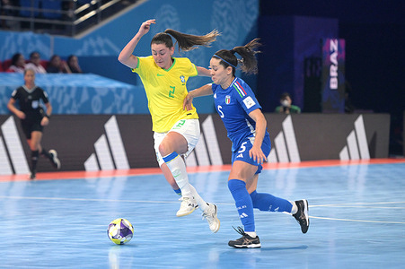 Debora Vanin (L) of Brazil Women Futsal team and Adrieli Berte' (R) of Italy Women Futsal team seen in action during the Group D First Stage match between Brazil and Italy at the FIFA Futsal Women's World Cup 2025 held at PhilSports Arena. Final score Brazil 6 : 1 Italy