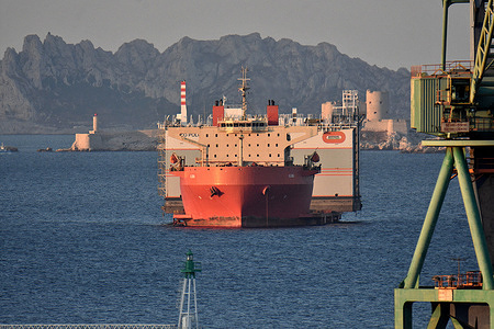 The semi-submersible Alma leaves Marseille after loading the floating caisson builder Marco Polo. The semi-submersible vessel Alma, carrying the Marco Polo floating caisson-manufacturing equipment, is leaving the French port of Marseille in the Mediterranean, bound for Taiwan.