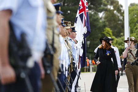 Governor of Victoria, Margaret Gardner (right), inspects the Tri-Service half Guard during a Remembrance Day service at the Shrine of Remembrance. Thousands gathered at the Shrine of Remembrance in Melbourne to mark Remembrance Day, honoring Australian service members who lost their lives in wars and conflicts. The annual ceremony includes moments of silence, wreath-laying, and tributes to veterans, reflecting on the sacrifices made for peace and freedom.