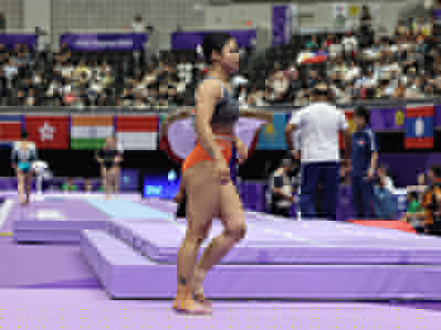 Female artistic gymnast Pranati Nayak of India seen during the 20th Asian Games at Nagoya General Gymnasysm, Rainbow Hall. She delivered a strong performance on the vault apparatus.