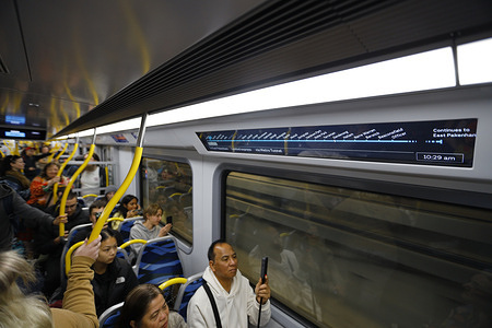 People crowd onto a train as Metro Tunnel services begin. The Metro Tunnel officially opens to the public on 30 November 2025, marking one of Victoria’s largest transport upgrades in decades. The project delivers five new underground stations—Arden, Parkville, State Library, Town Hall, and Anzac—connecting key areas across Melbourne’s CBD and inner suburbs. The new tunnel separates the Sunbury and Cranbourne/Pakenham lines from the City Loop to increase capacity, reduce congestion, and improve reliability across the network. Opening day sees trains running through the new route for the first time, with passengers exploring the modern stations, upgraded platforms, and redesigned interchange connections.