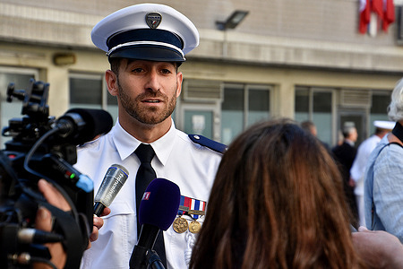 One of the 65 new police officers answers questions from journalists during the welcoming ceremony. Around 65 new police officers arrived in Marseille, welcomed by the Minister of the Interior, Gérald Darmanin, at the Hotel de Police.