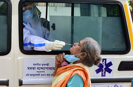 A health worker doing a swab test on a person suspected to have coronavirus. 
Covid-19 cases are increasing day by day in India along with Kolkata. Kolkata Municipal Corporation's health department has started testing Random persons through mobile testing ambulances.
